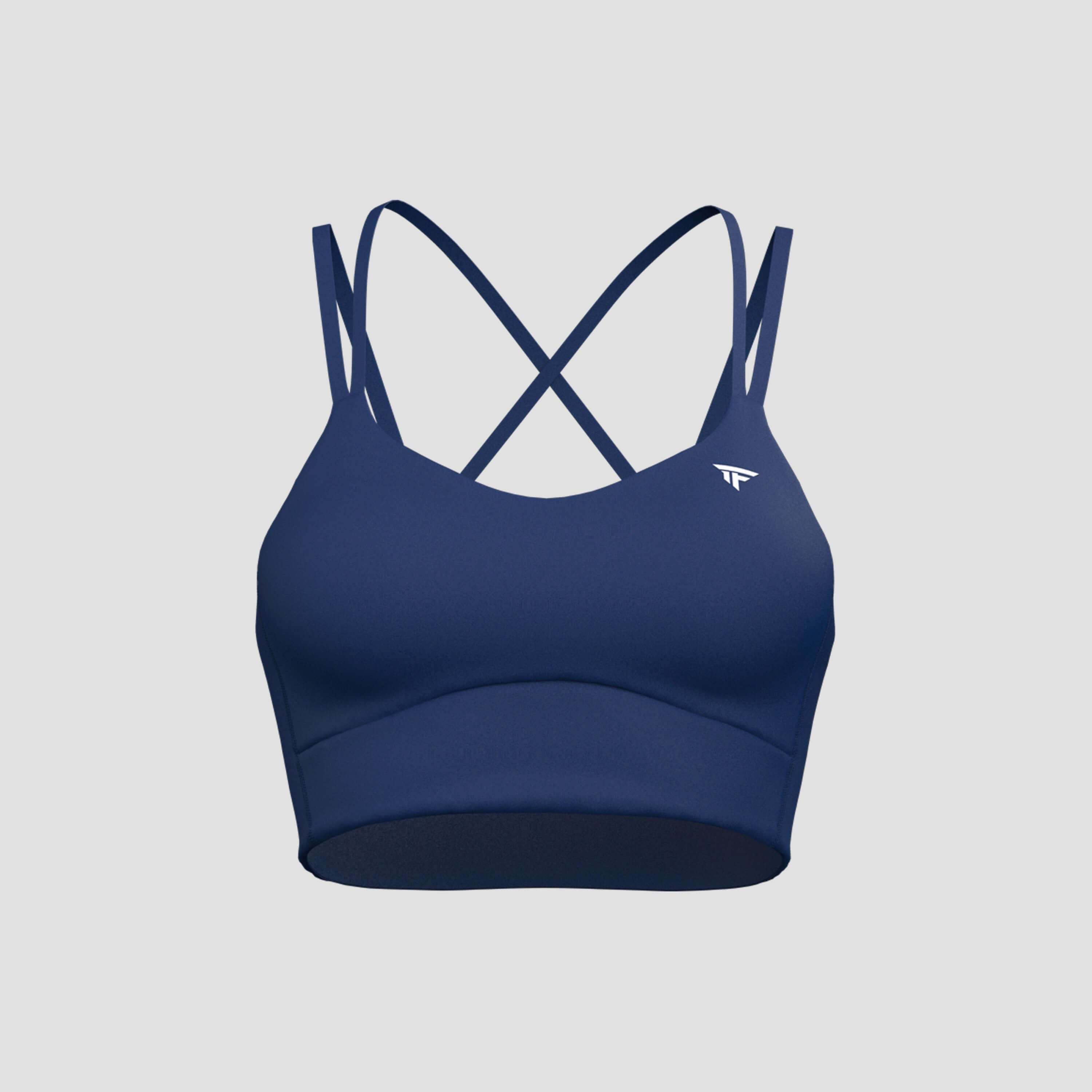 The Cross-Motion Bra in navy with criss-cross straps for lifting and cycling comfort.