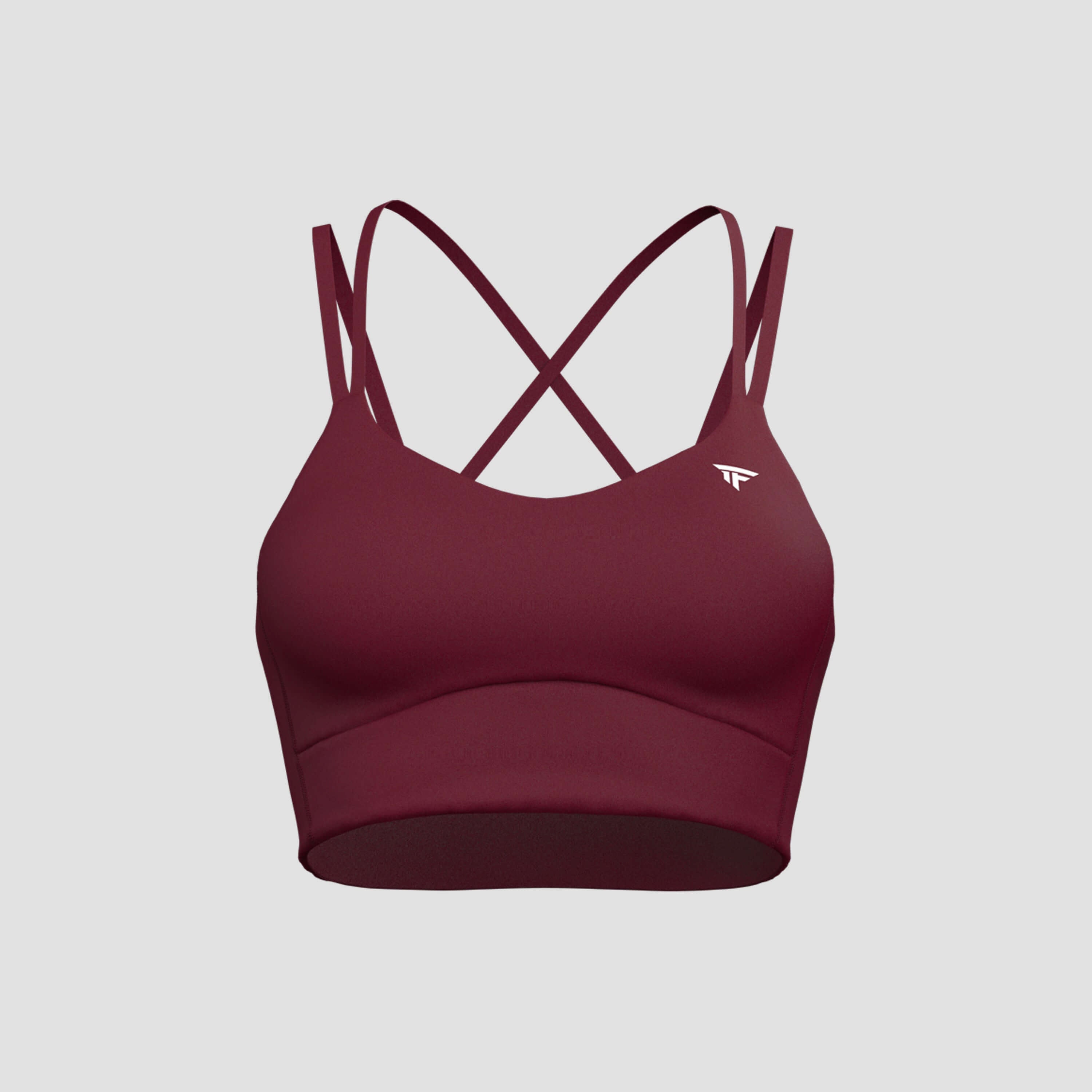 The Cross-Motion Bra in burgundy color with criss-cross straps for optimal support during workouts.