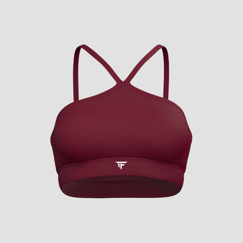 The Contour Halter Bra in burgundy color showcasing its distinct neckline and supportive design.