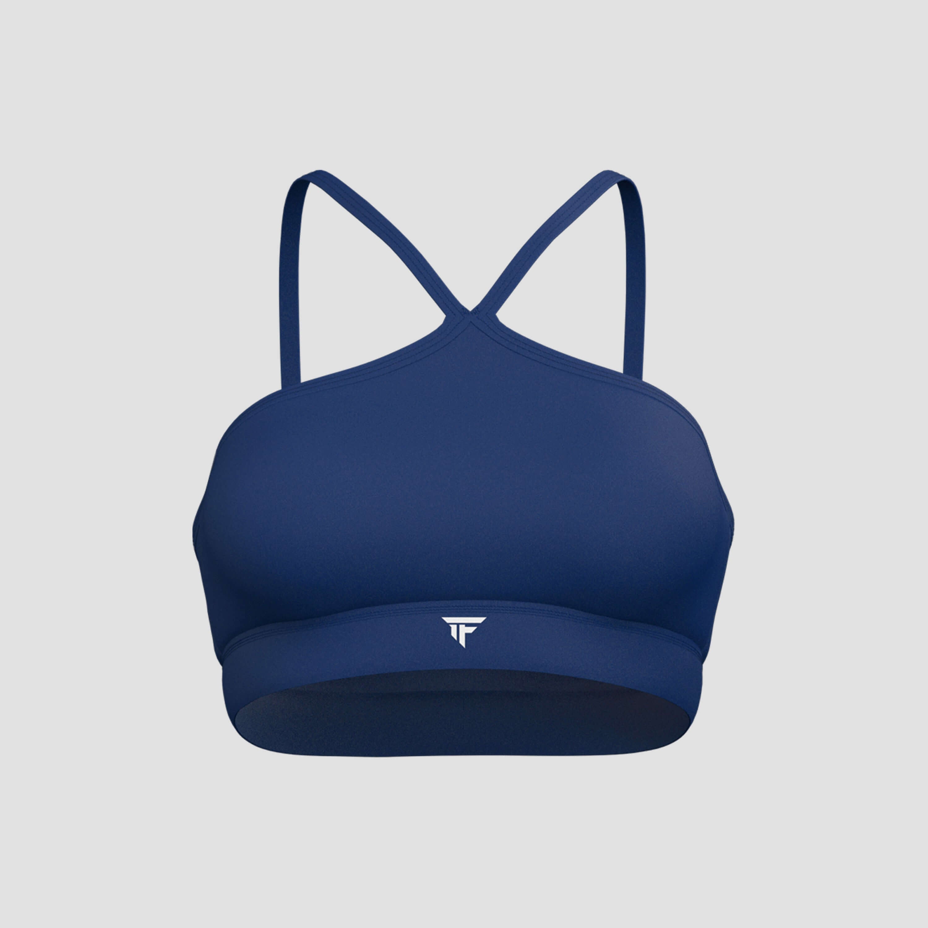 The Contour Halter Bra in navy blue, featuring a distinct neckline and cross-back straps for comfort and support.