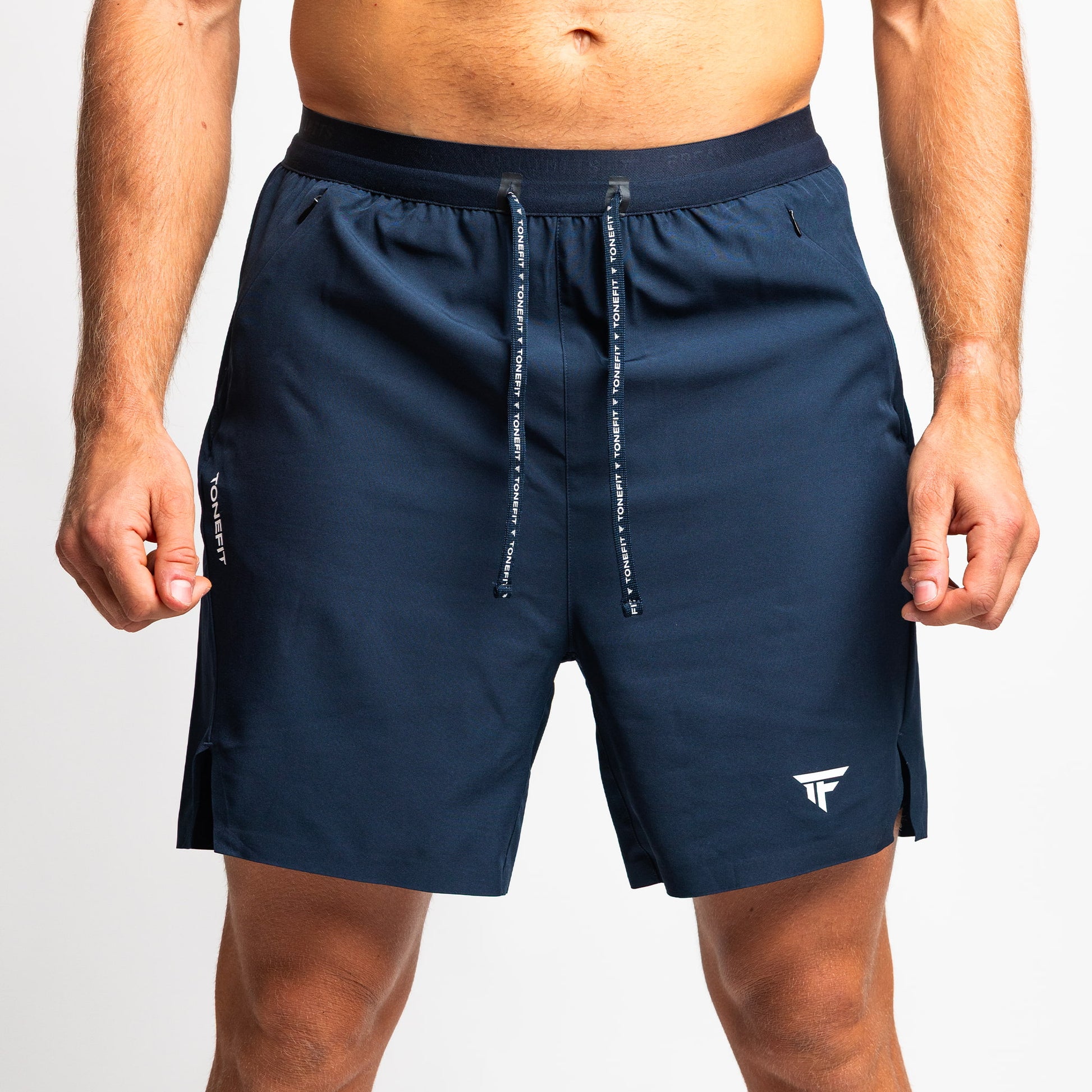 Front view of TONEFIT men’s dark sapphire performance shorts with functional drawstrings.