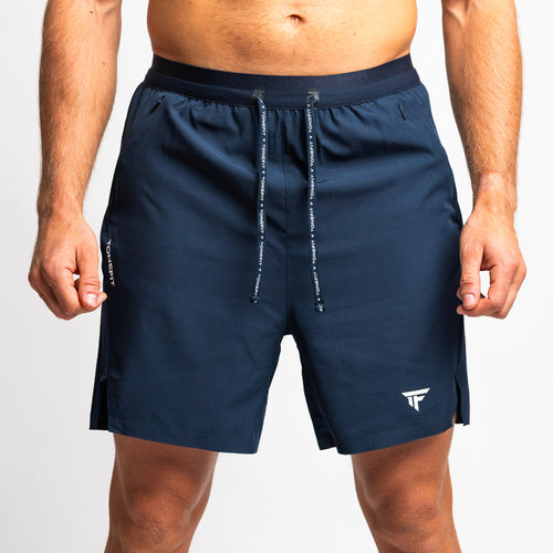 Front view of TONEFIT men’s dark sapphire performance shorts with functional drawstrings.