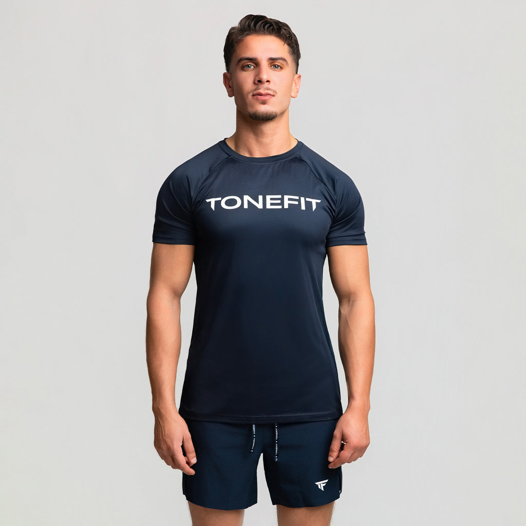 Front view of TONEFIT men’s dark sapphire performance t-shirt with model and clean silhouette.