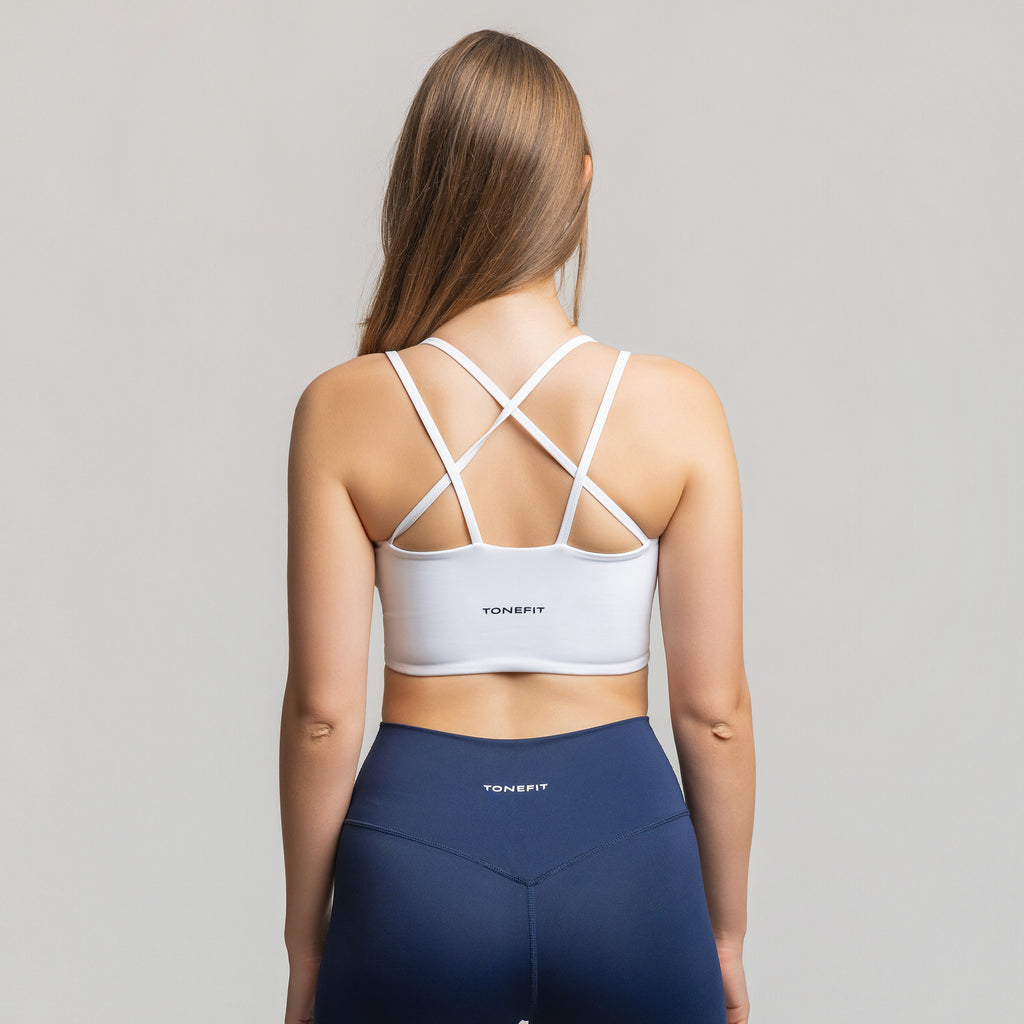 Back view of TONEFIT women’s Criss-Cross Strappy Bra in white featuring cross-back straps and TONEFIT logo