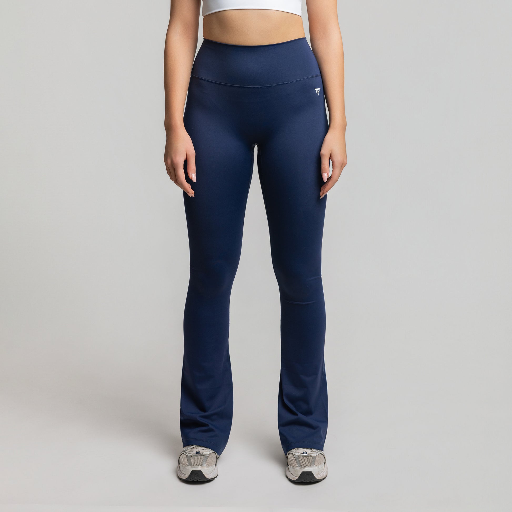 Front  view of Deep Sapphire Flare Leggings featuring curve-accentuating waistband