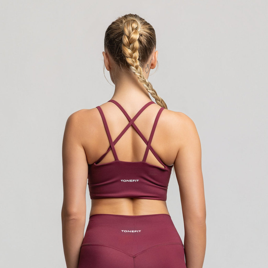 TONEFIT women’s criss-cross back sports bra in deep plum – full back view showing strap design