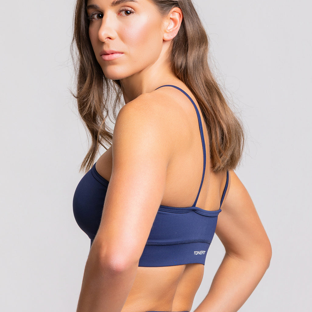 TONEFIT women’s sapphire blue halter crop bra – angled back view showing sleek double straps